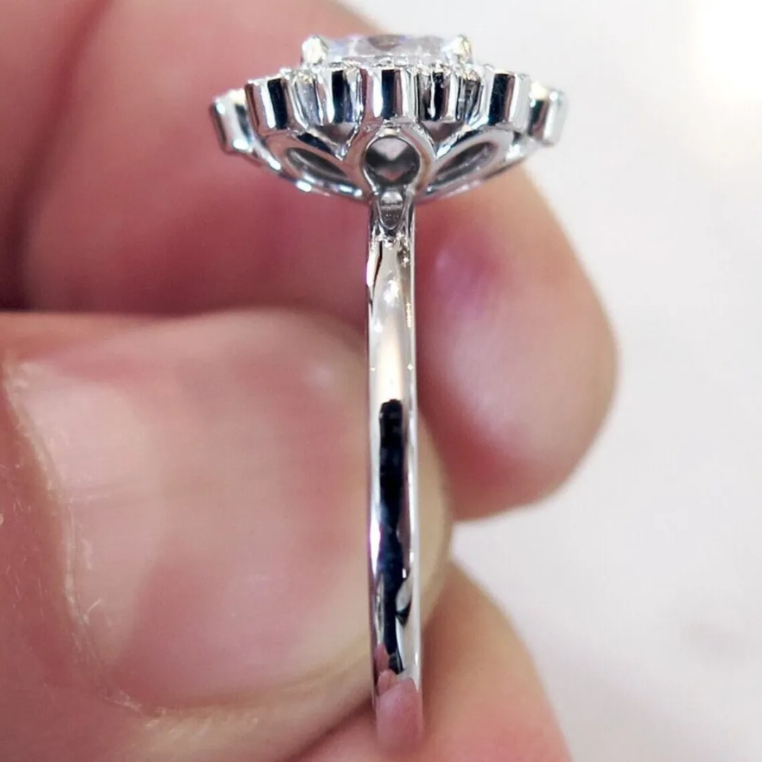 /public/photos/live/Round Cut Moissanite Floral Halo Engagement Ring 721 (1).webp